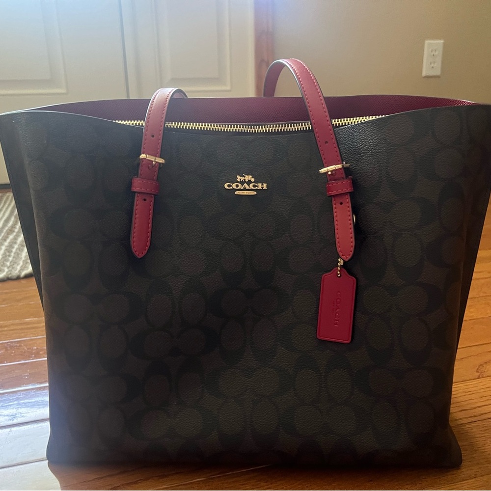 Brown and red Coach satchel.
